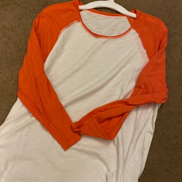 orange and white baseball shirt